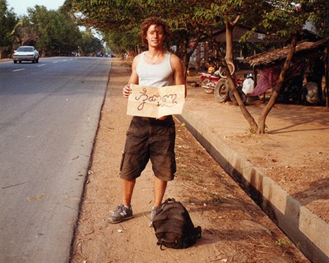 Ryan Spencer hitchhiking in Cambodia