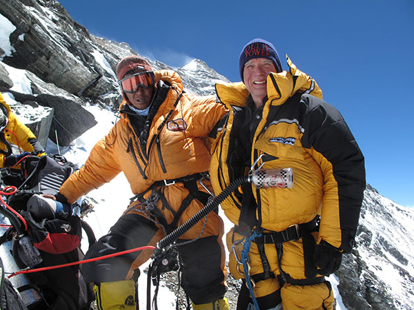 Photo of Bill Burke and his Sherpa heading into Camp 3-North Side Expedition 2010