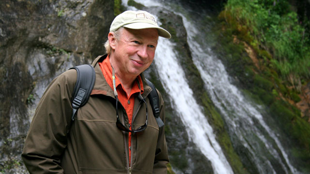 Photo of Richard Bangs exploring waterfalls
