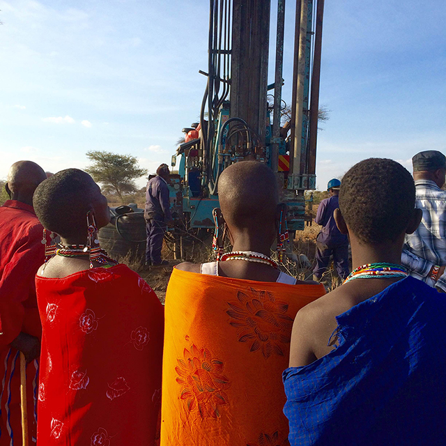 Massai Watching the Drilling