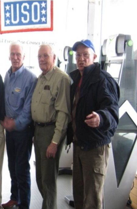 Photo of with Neil Armstrong and Gene Cernan, first and last men on the moon in the USO at Ramstein AFB, Germany